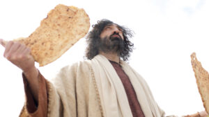 "… looked up into the sky, and gave thanks. Then he broke off pieces for his disciples to set before the crowd."